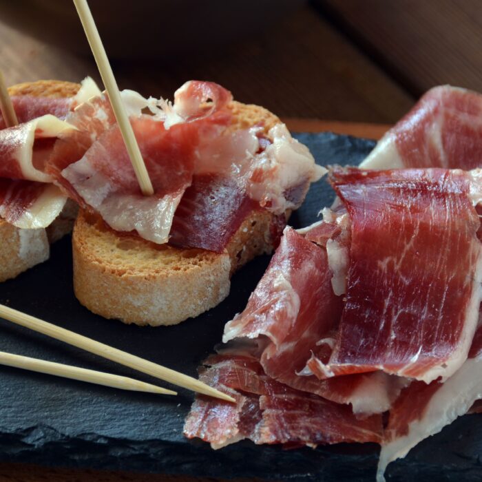 Tapas are small individual portions or sharing plates of typical Spanish food.